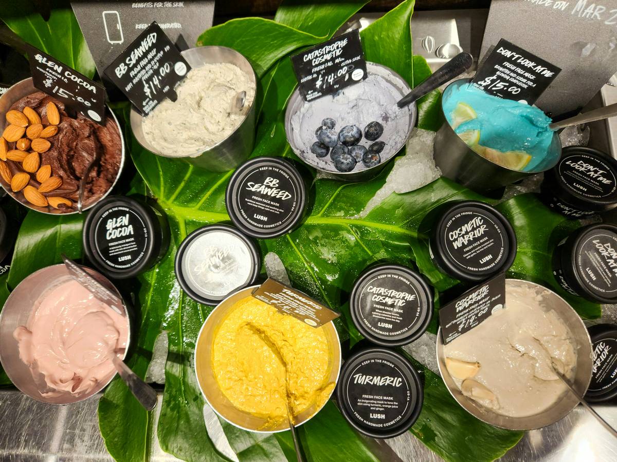 Comparison of eco product packaging showing compostable vs plastic containers